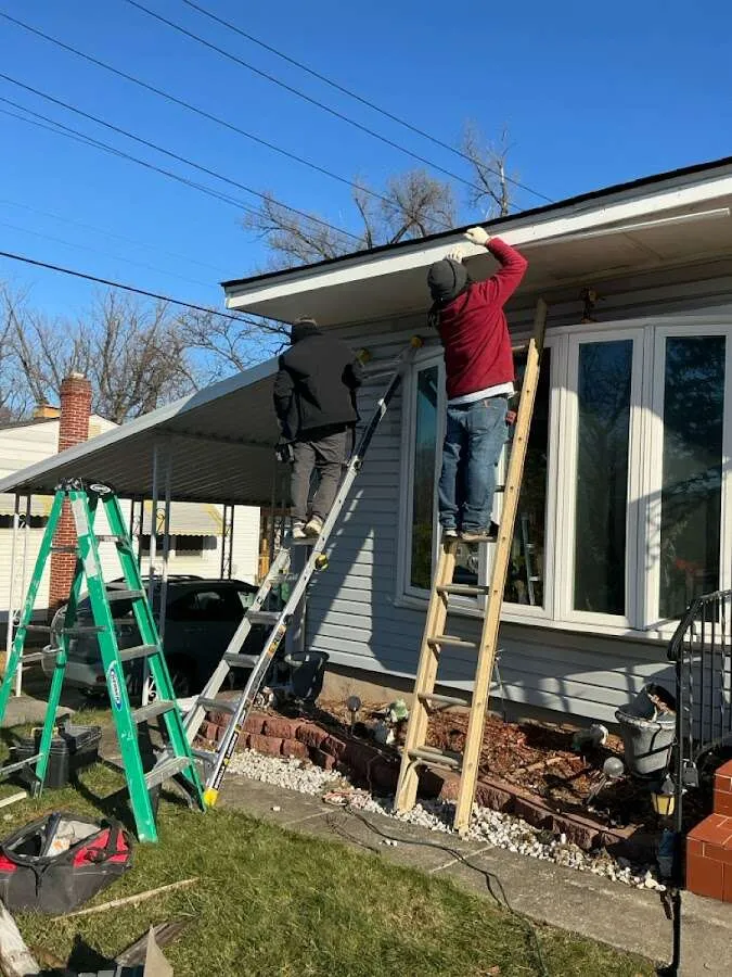 Restoration crew performing exterior repair in Aurora